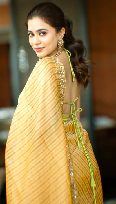 Pics: Anju Kurian Dazzles In Yellow Saree Photoshoot