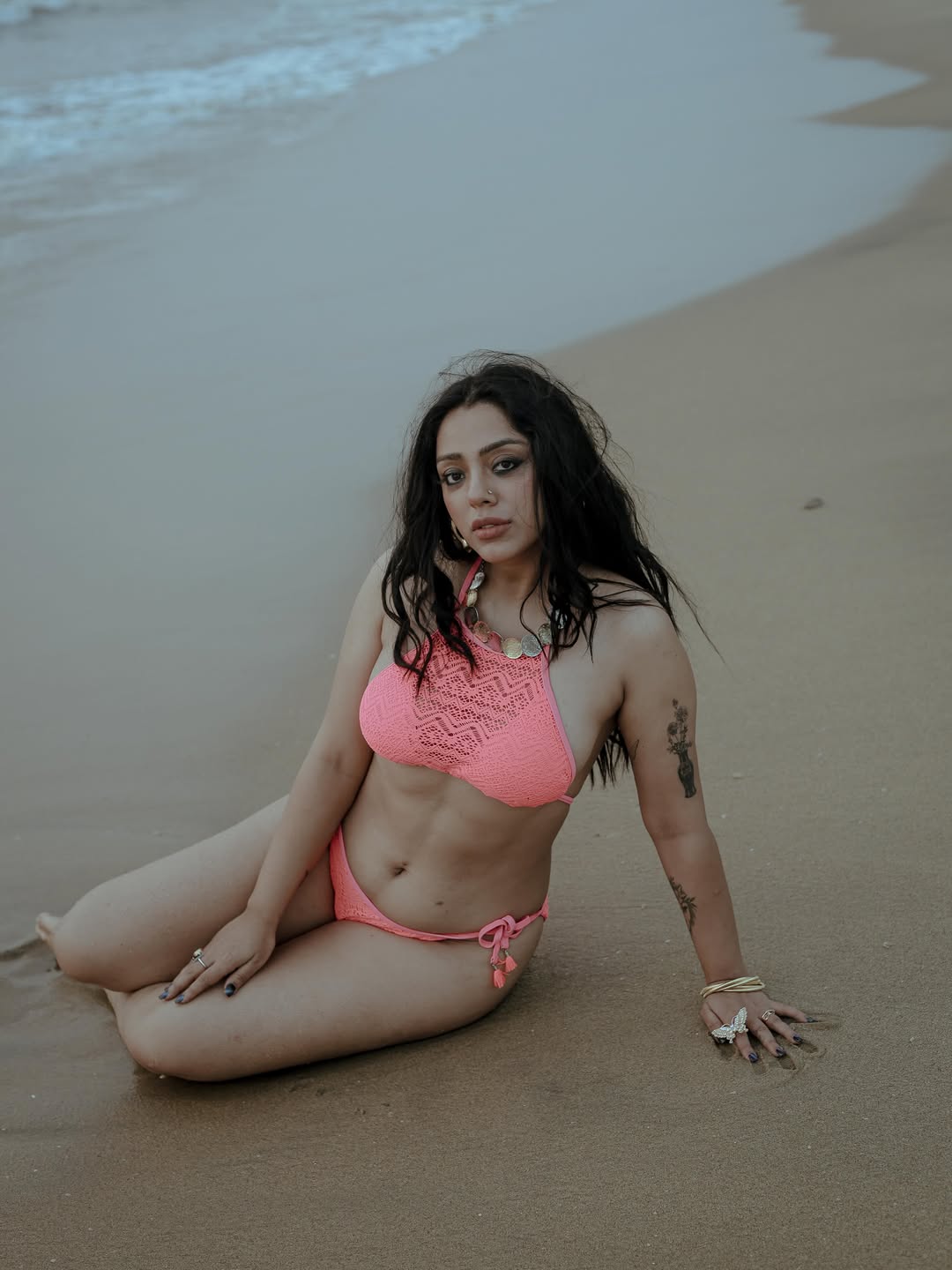 Deviyani Sharma Posing Boldly On Sandy Beach