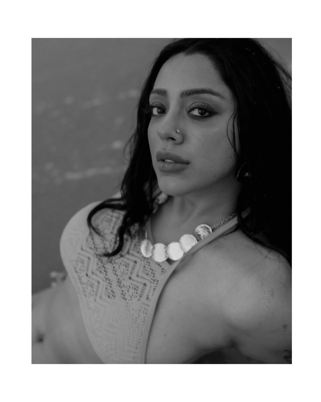 Deviyani Sharma Elegant Tattoos On Sandy Beach