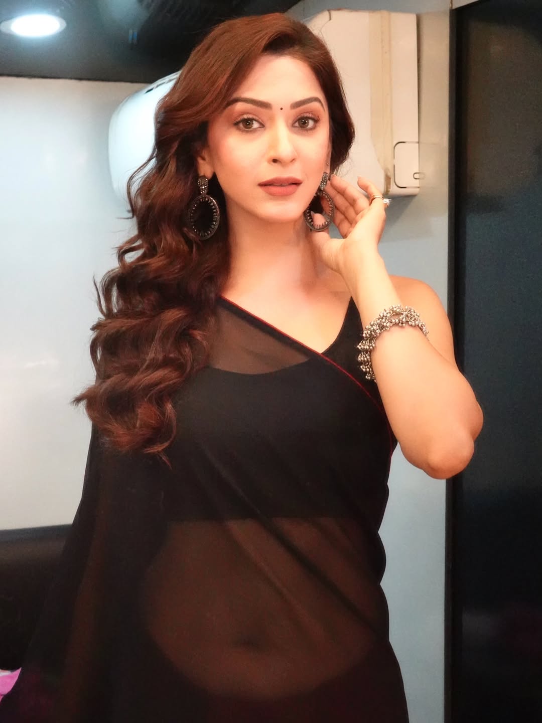 Eshaanya Maheshwari Touching Her Statement Earring