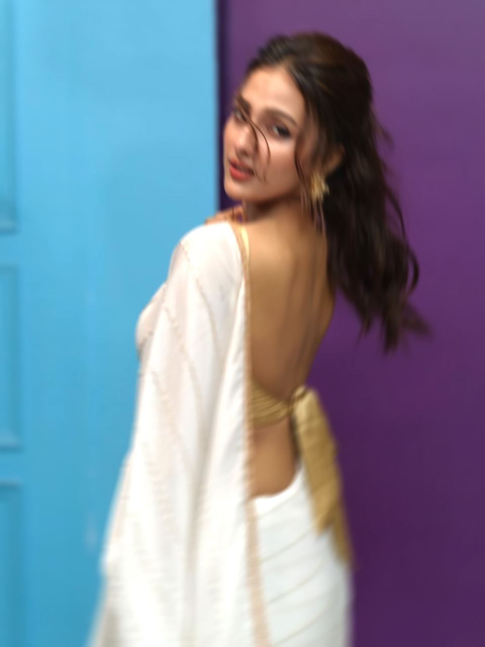 Jyotirmoyee Flaunts Edgy Motion Blur Backless Look