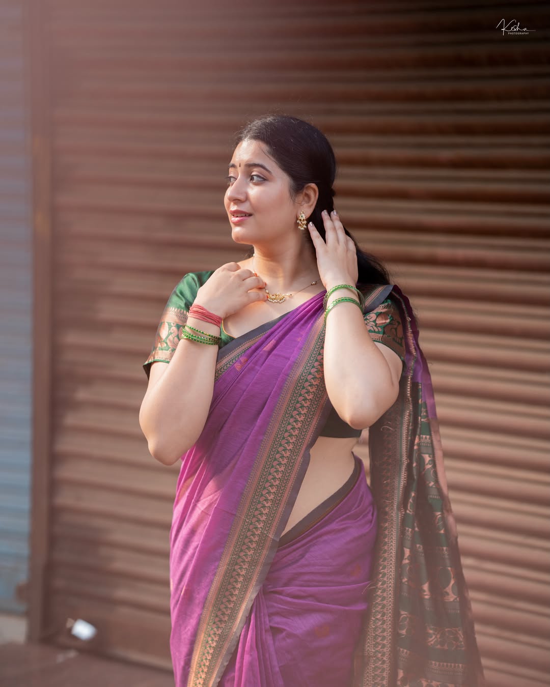 K Sudha Looking Down With Graceful Hand Pose