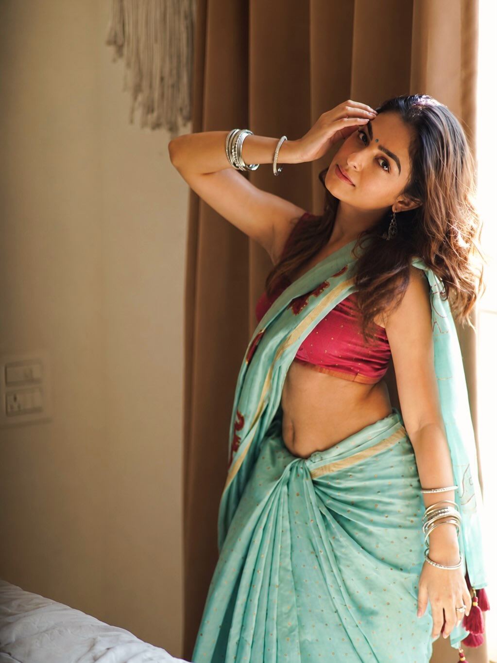 Maira Doshi Striking A Chic Side Profile Pose Image