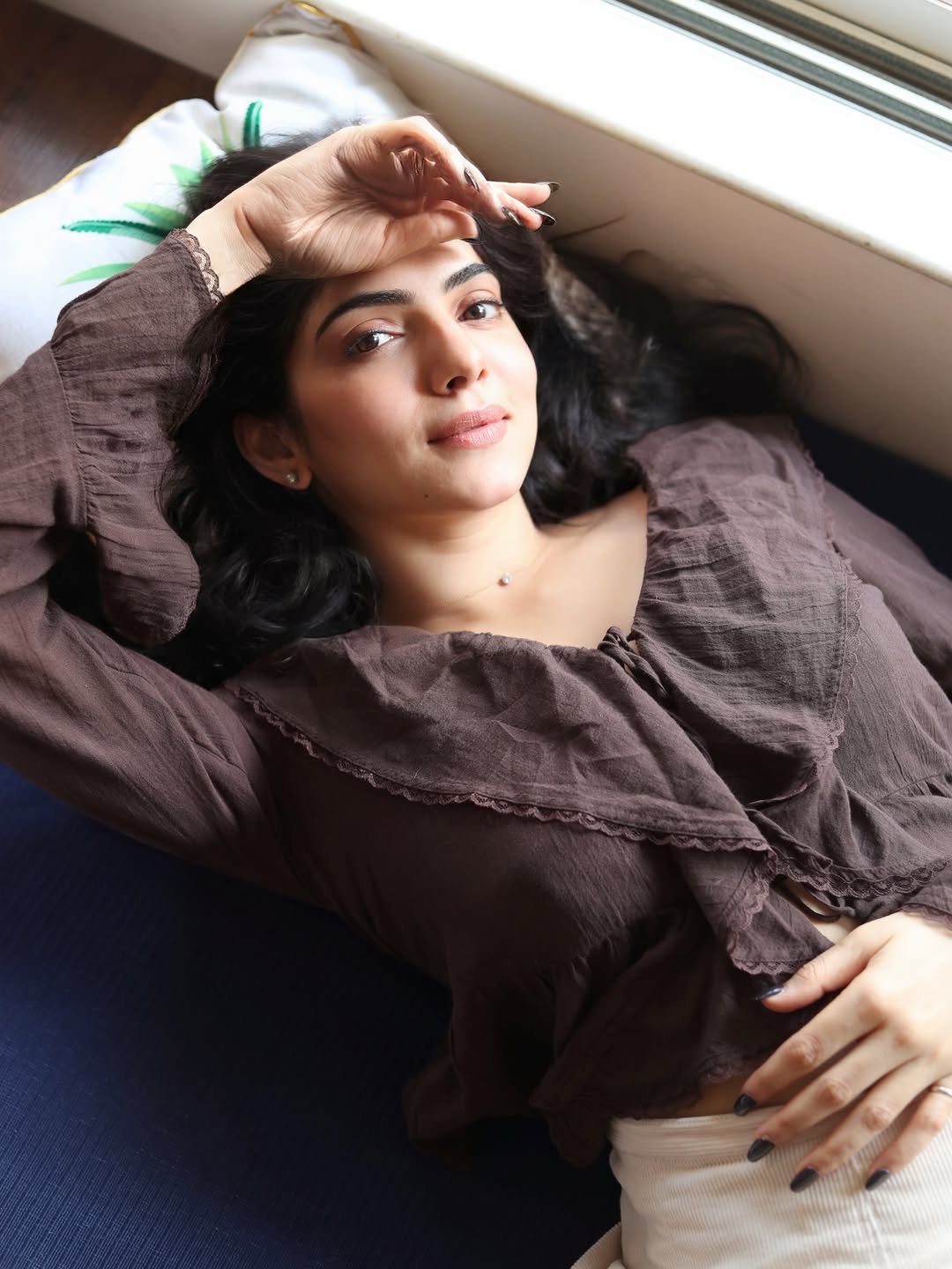 Misha Narang Relaxed Glam Couch Pose