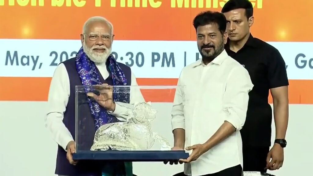 Modi and Revanth at Hyderabad event