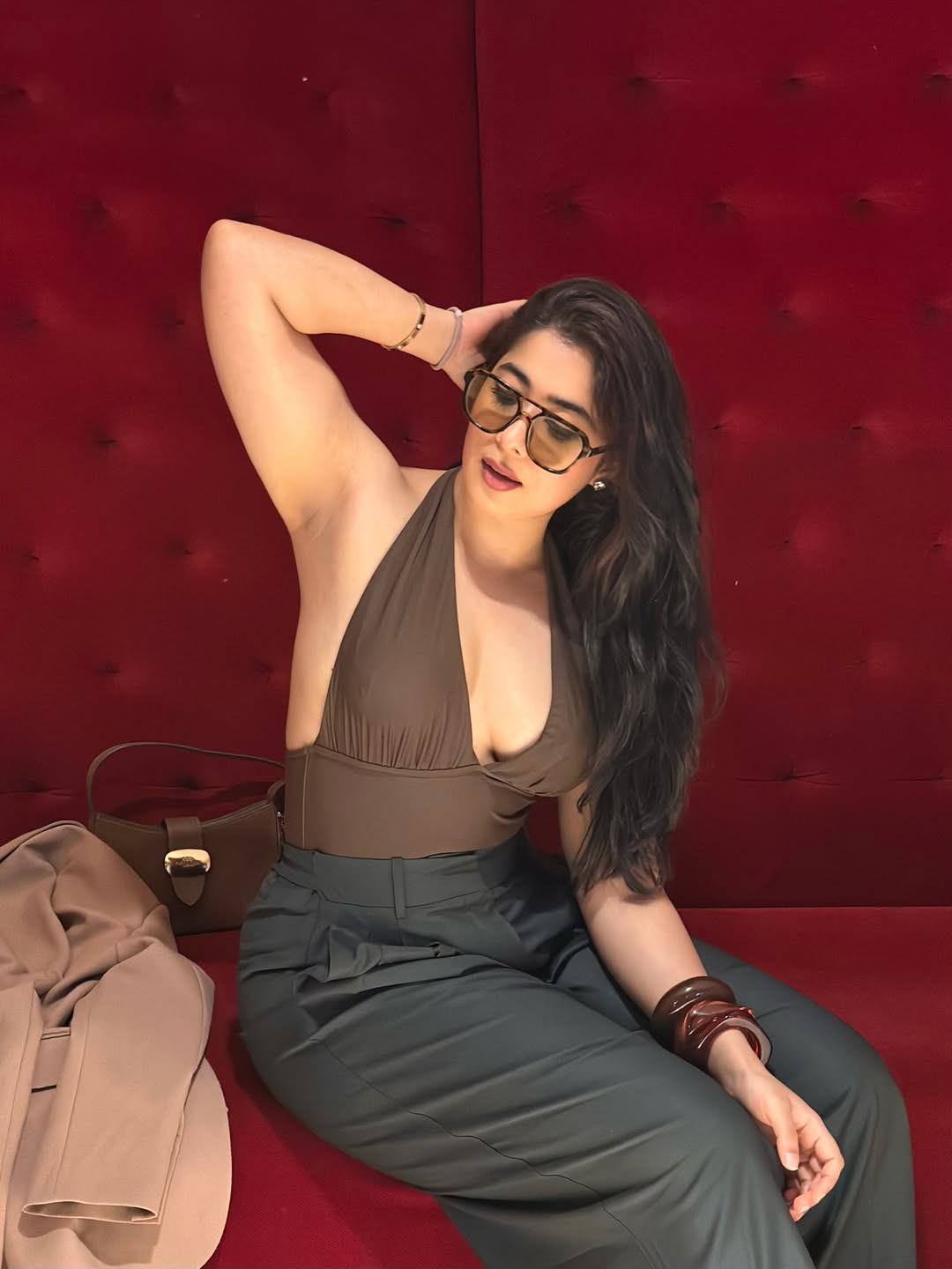 Nikita Sharma Poses In Sleek Brown Halter Top
