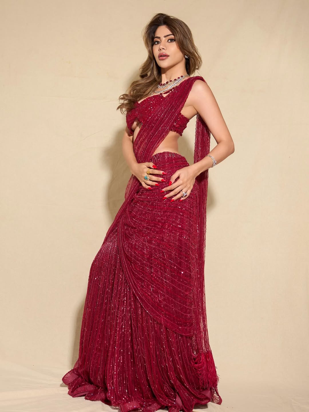 Nikki Tamboli In Hot Red Saree Full Length Pose