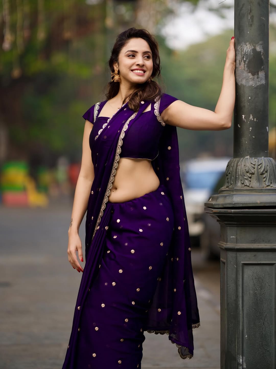 Priyanka Kholgade Posing In Bold Purple Saree