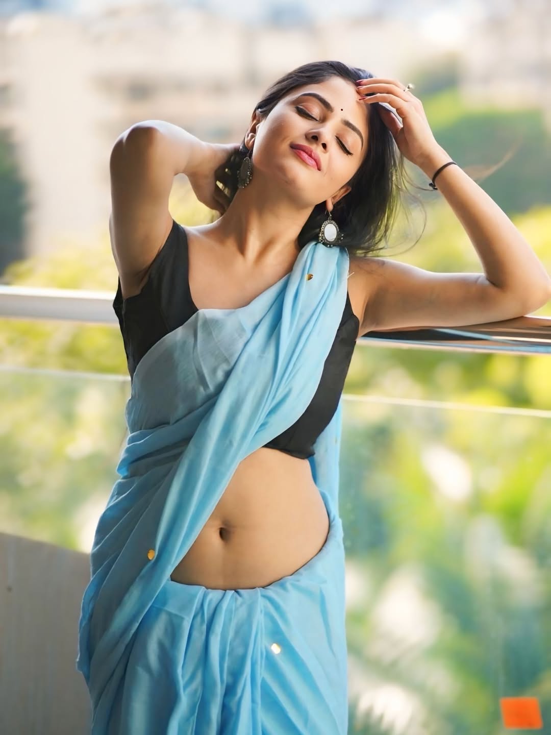 Sanya Thakur Closed Eyes Relaxed Outdoor Saree Pose