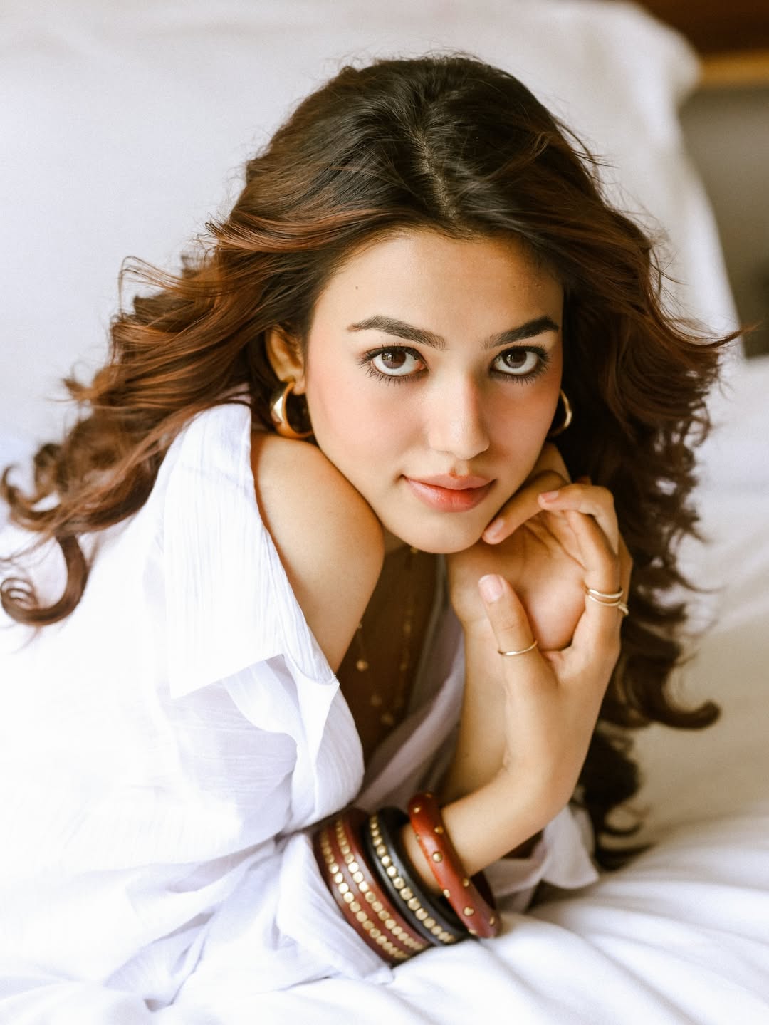 Hot Vidhi Yadav Leaning Against White Bedding