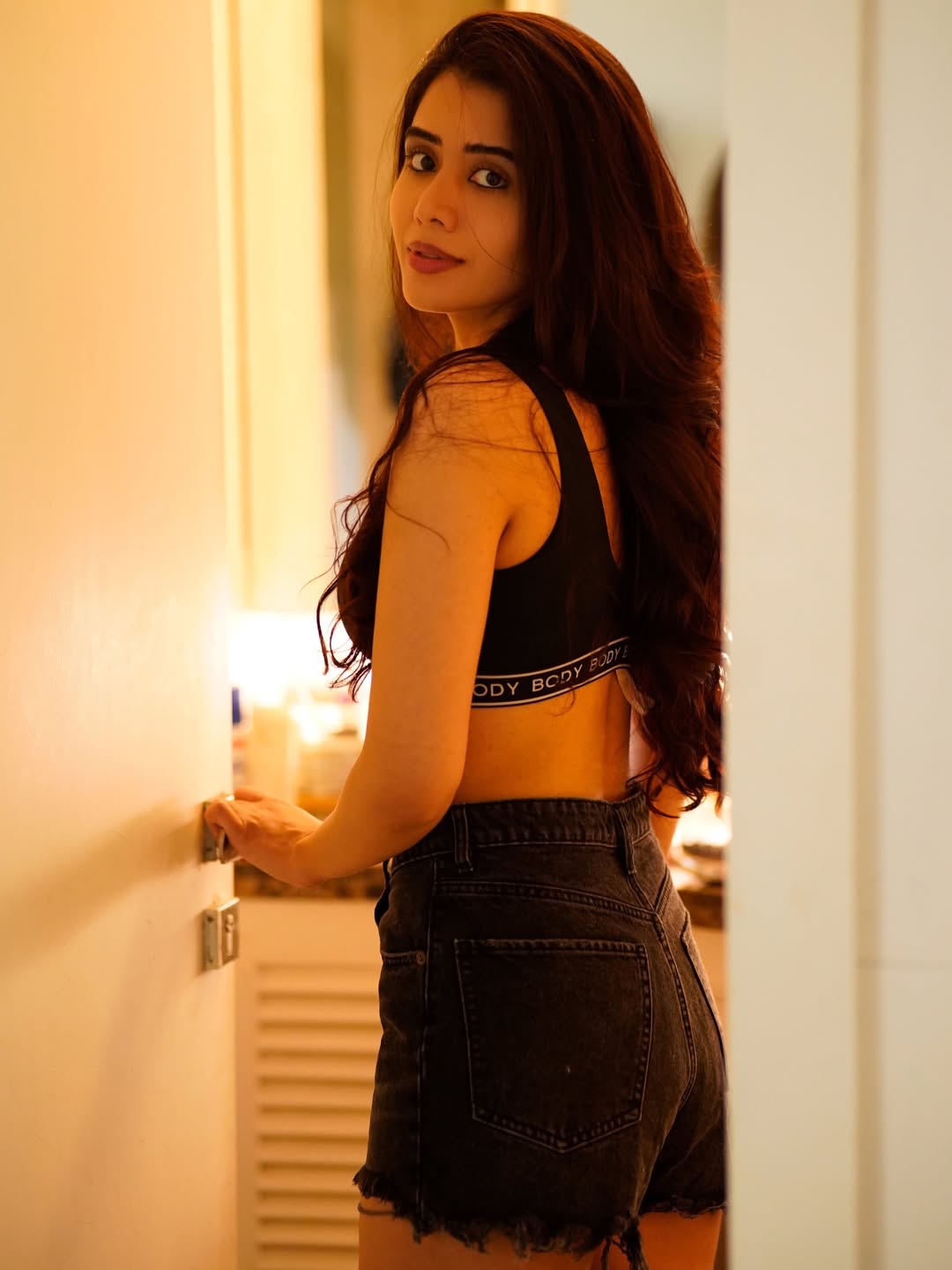 Aarti Chikara Looking Away Thoughtfully Indoors