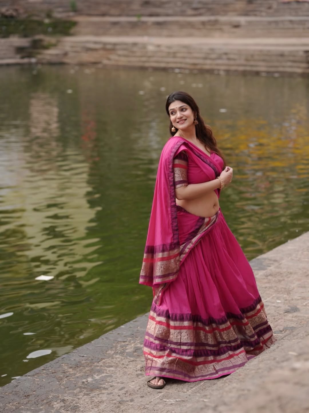 Aditi Gautam Looking Away Near Temple Steps Bank
