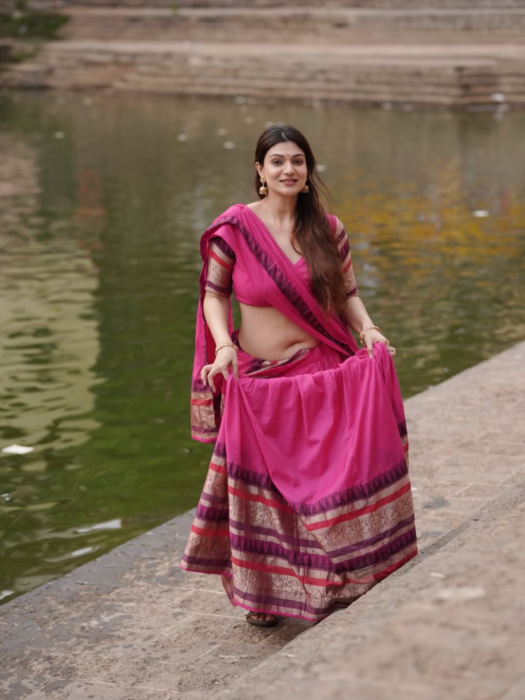 Aditi Gautam Side Profile Posing In Pink Blouse