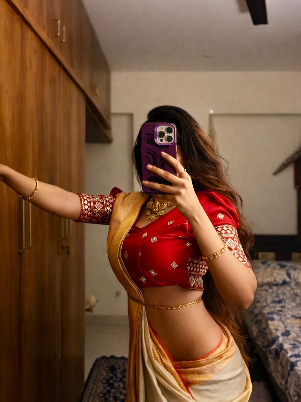 Aparna Reddy Obscuring Face With Purple Phone