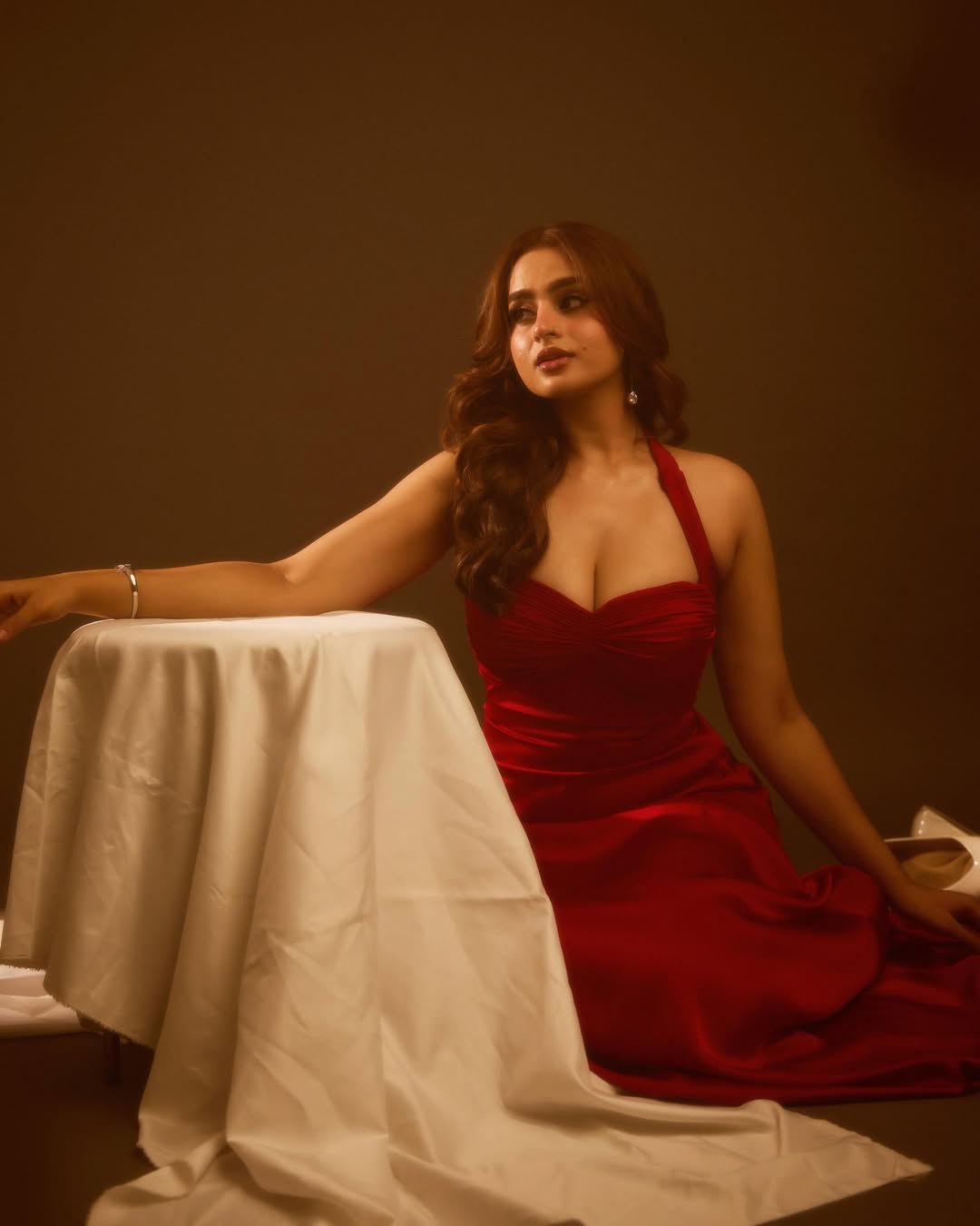 Ayesha Khan Posing Elegantly In Red Halter Gown