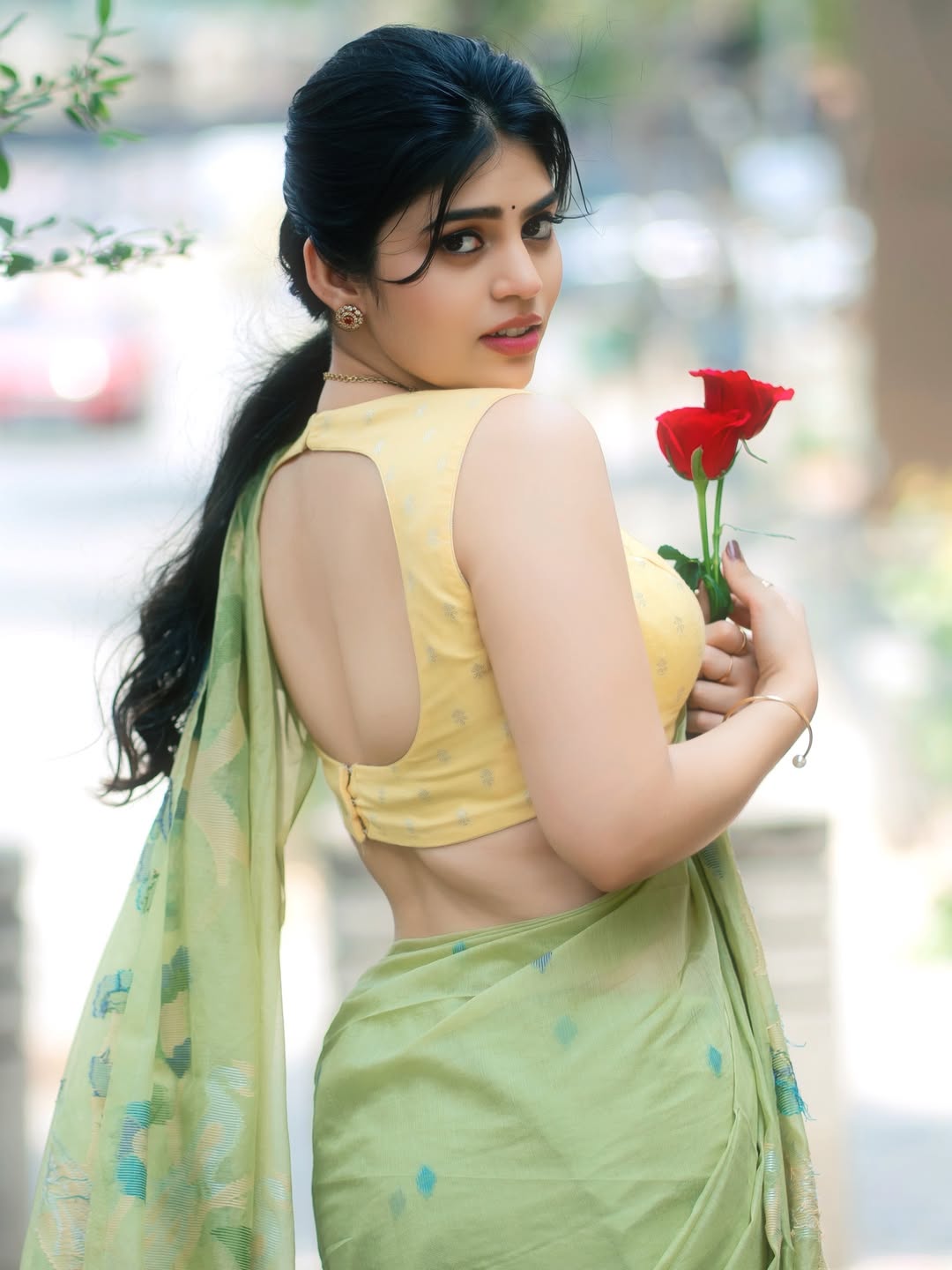 Bandhavi Sridhar Backless Blouse Pose With Rose