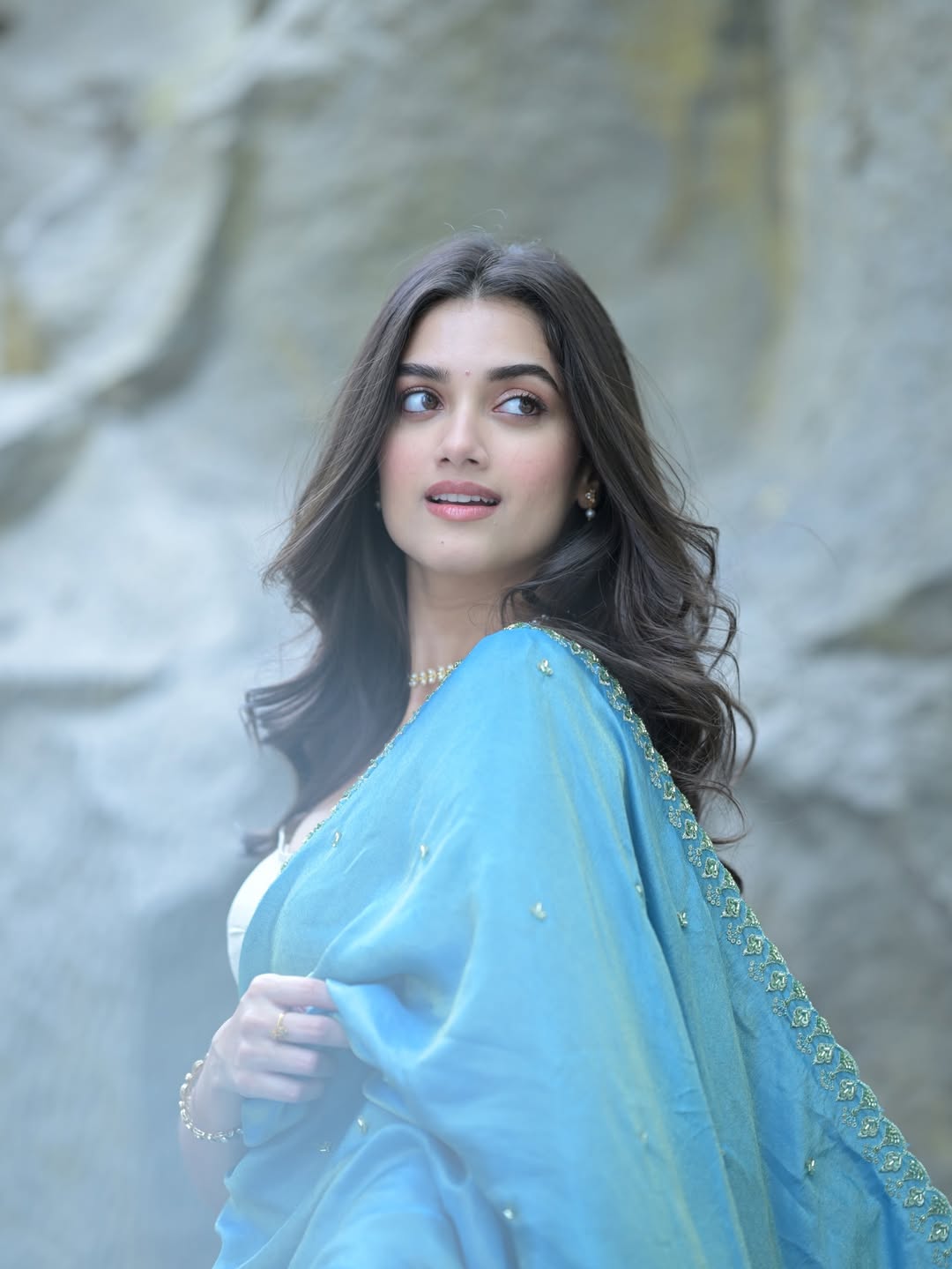 Bhagyashri Borse Looking Back In Flowing Lehenga
