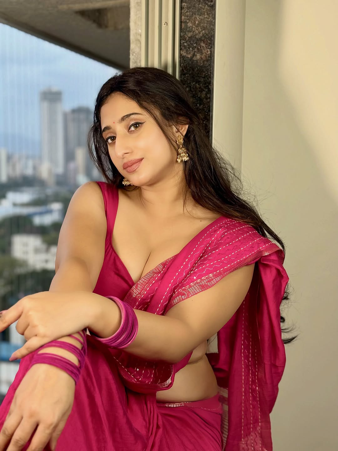 Kheyali Nath Posing Gracefully By The Balcony