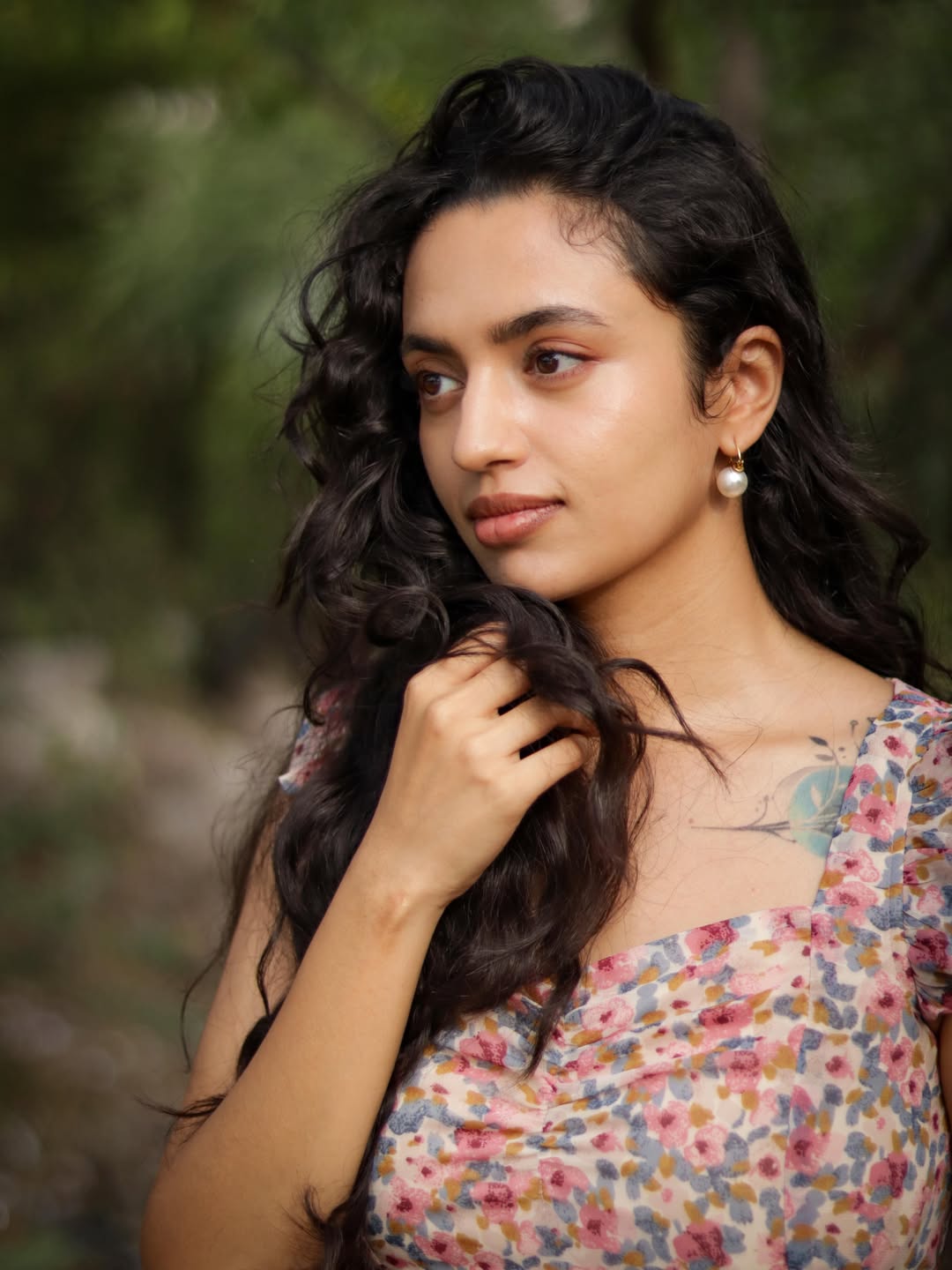 Malavika Nair Posing Gracefully In Nature Backdrop