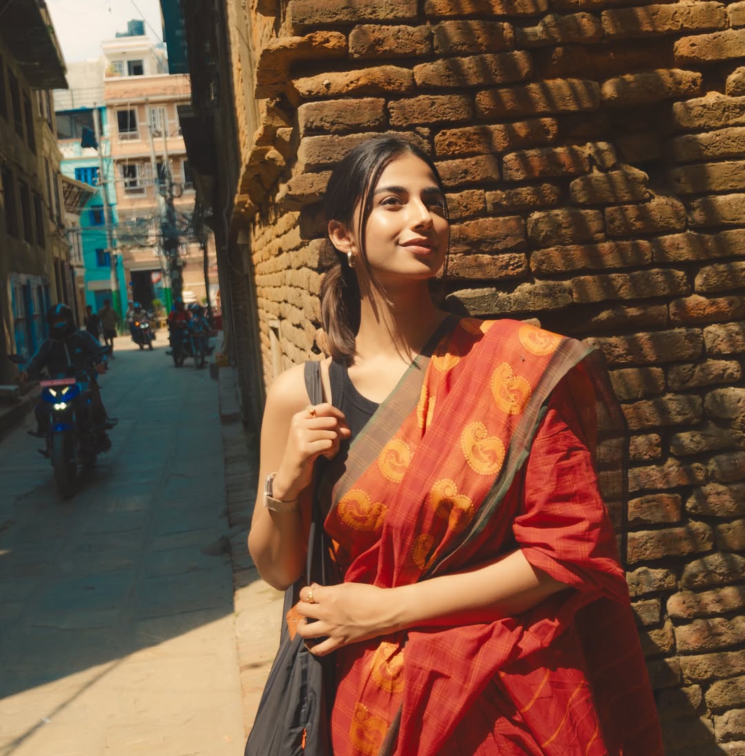 Meenakshi Chaudhary Stylish Heritage Walk Pose