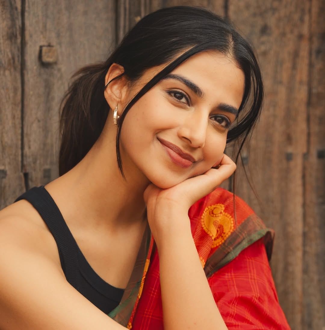 Meenakshi Chaudhary Smiles In Red Saree Portrait