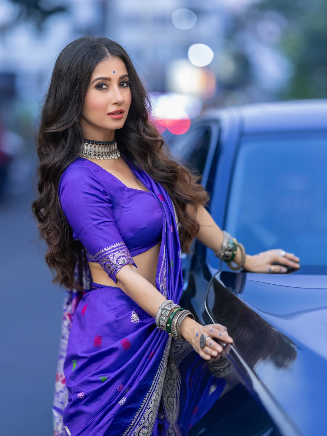 Monami Ghosh Playful Expression Leaning On Car