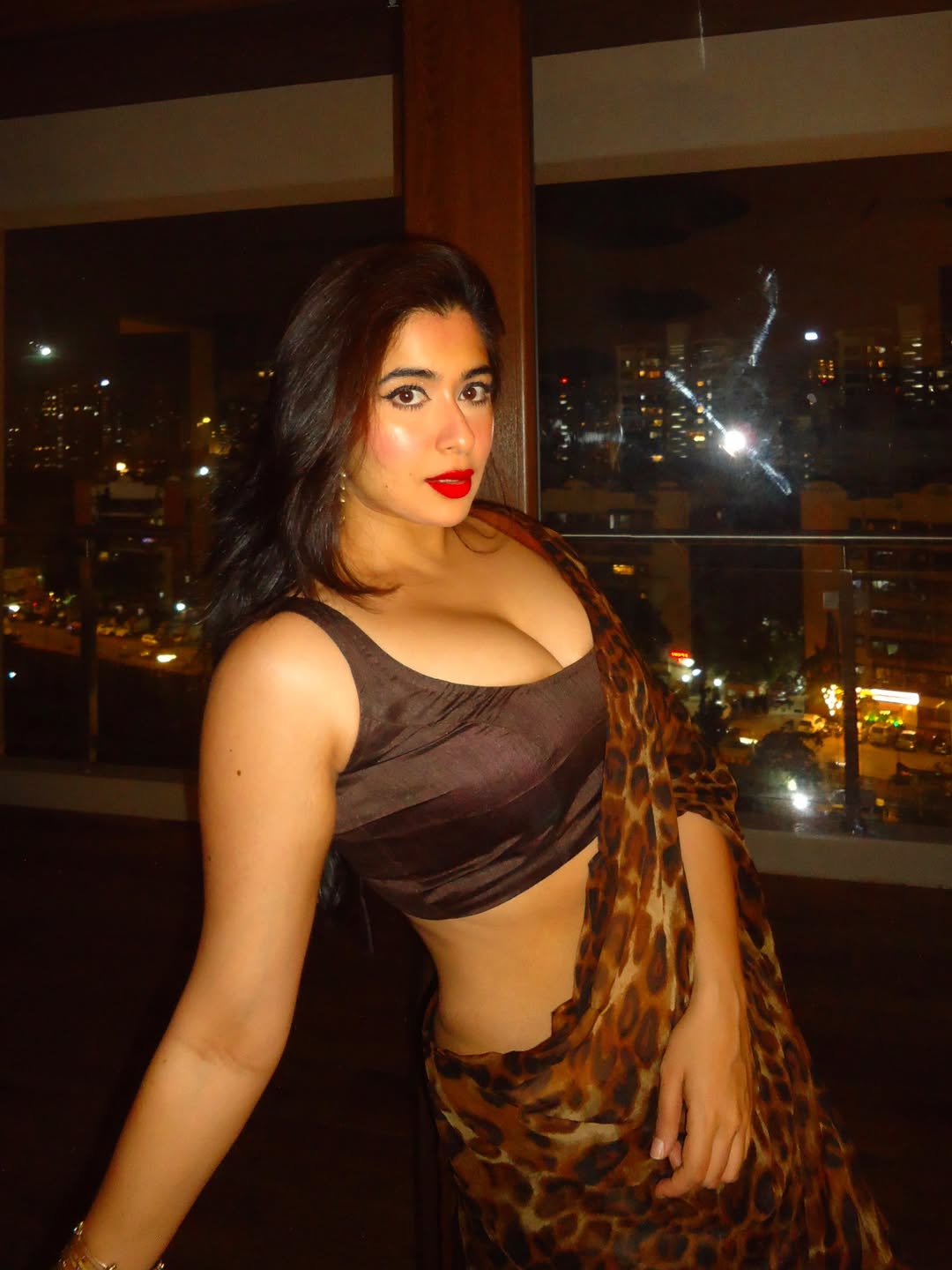 Nikita Sharma Wearing Statement Golden Earrings
