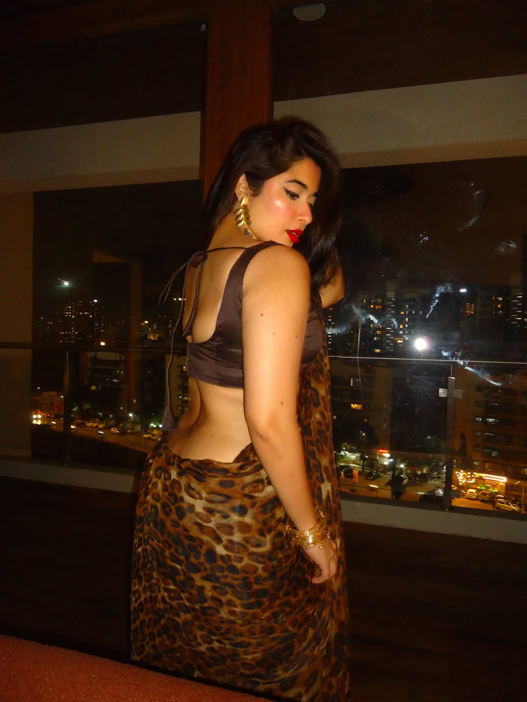Nikita Sharma Showcasing Sleek Sleeveless Blouse