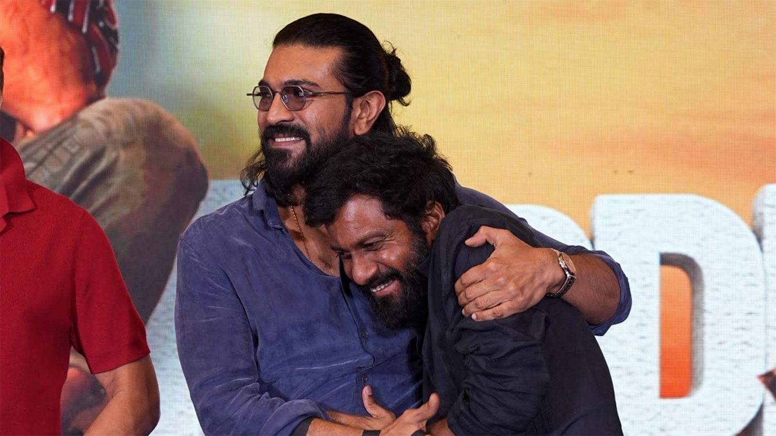 Peddi Mixed Reviews Buchi Babu Ram Charan