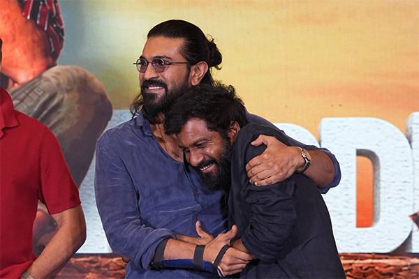 Peddi Mixed Reviews Buchi Babu Ram Charan