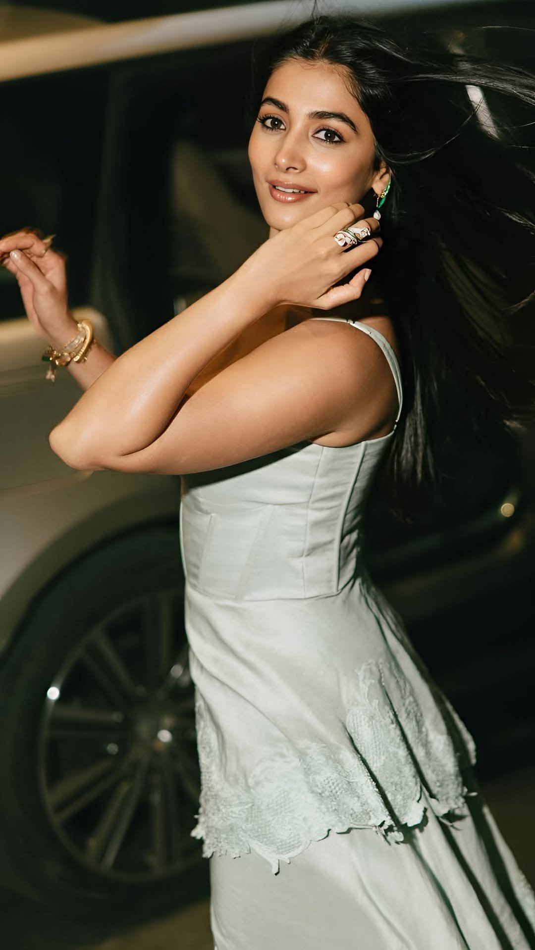 Pooja Hegde Windy Hair Candid Smiling Portrait