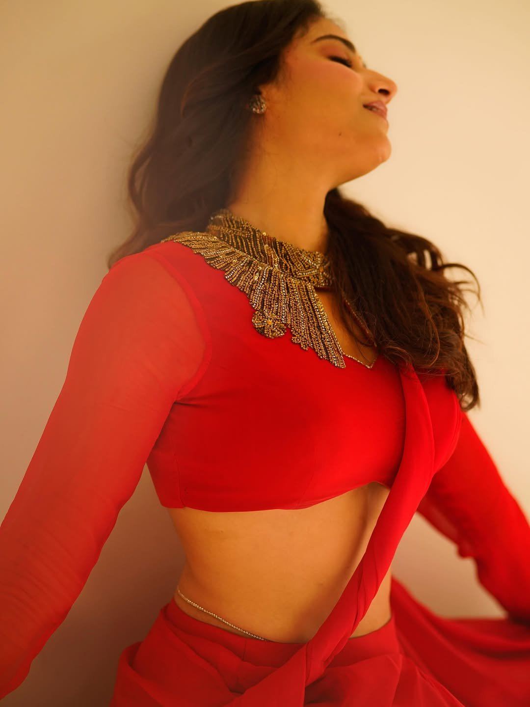 Prisha Singh In Red Saree Side Profile Glam Look