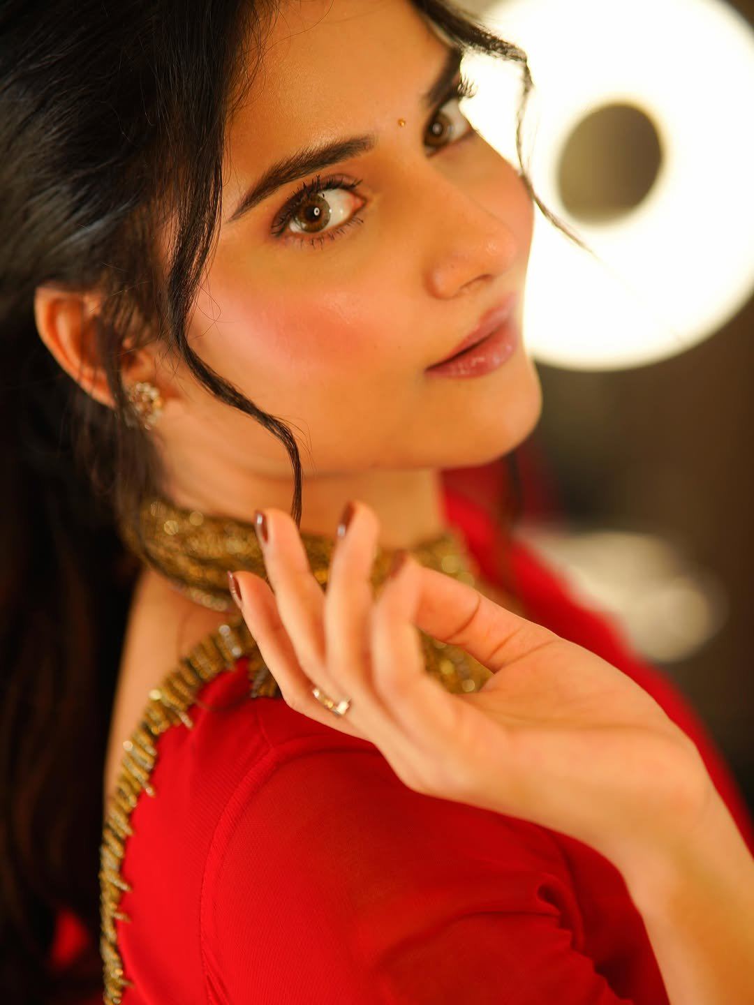 Prisha Singh In Red Saree Intense Gaze Portrait