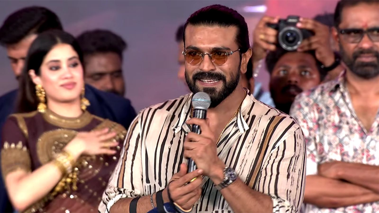 Ram Charan speaking at Peddi pre-release event