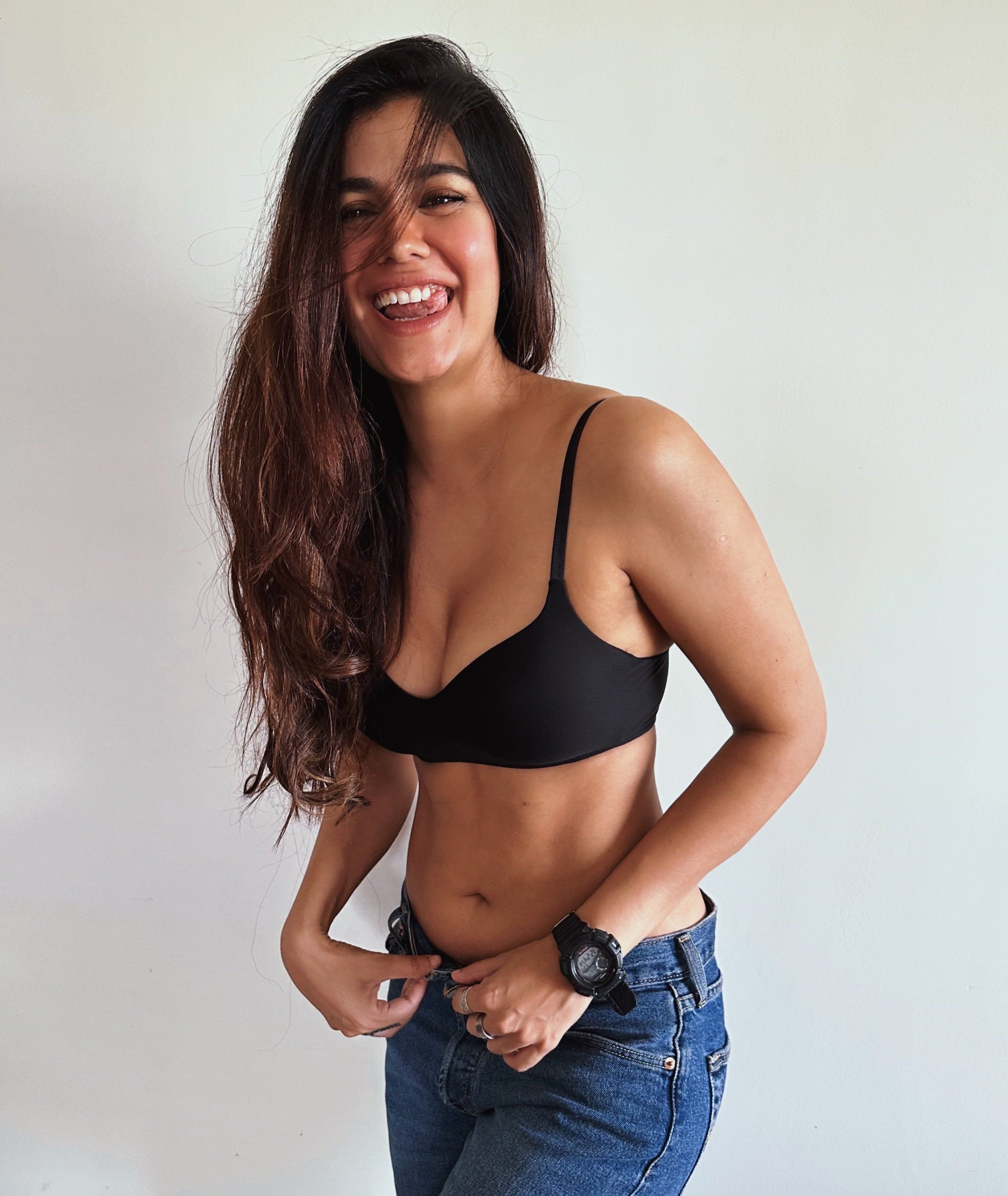 Shreya Dhanwanthary Playful Laughing Bralette Pose
