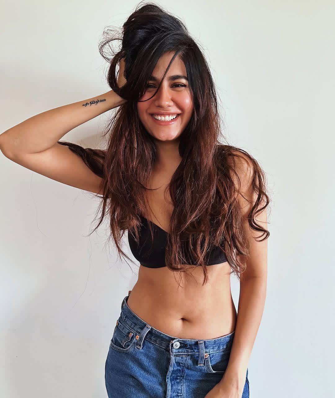 Shreya Dhanwanthary Black Top Messy Hair Styling