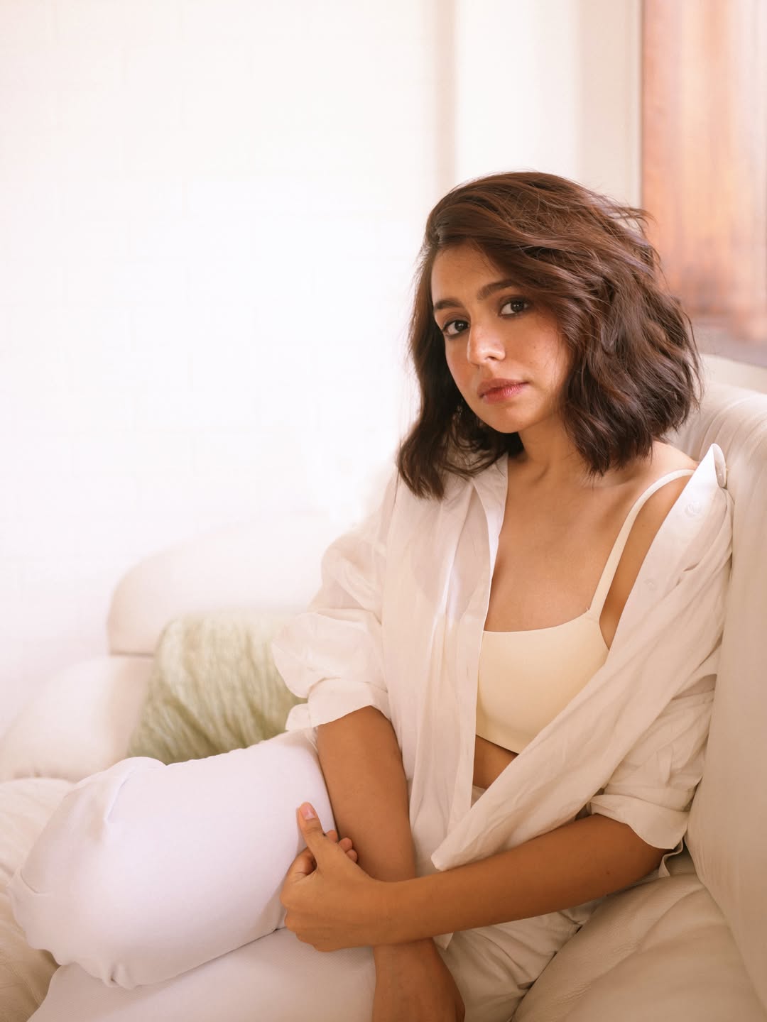 Srishti Ganguli Lounging Comfortably On Couch