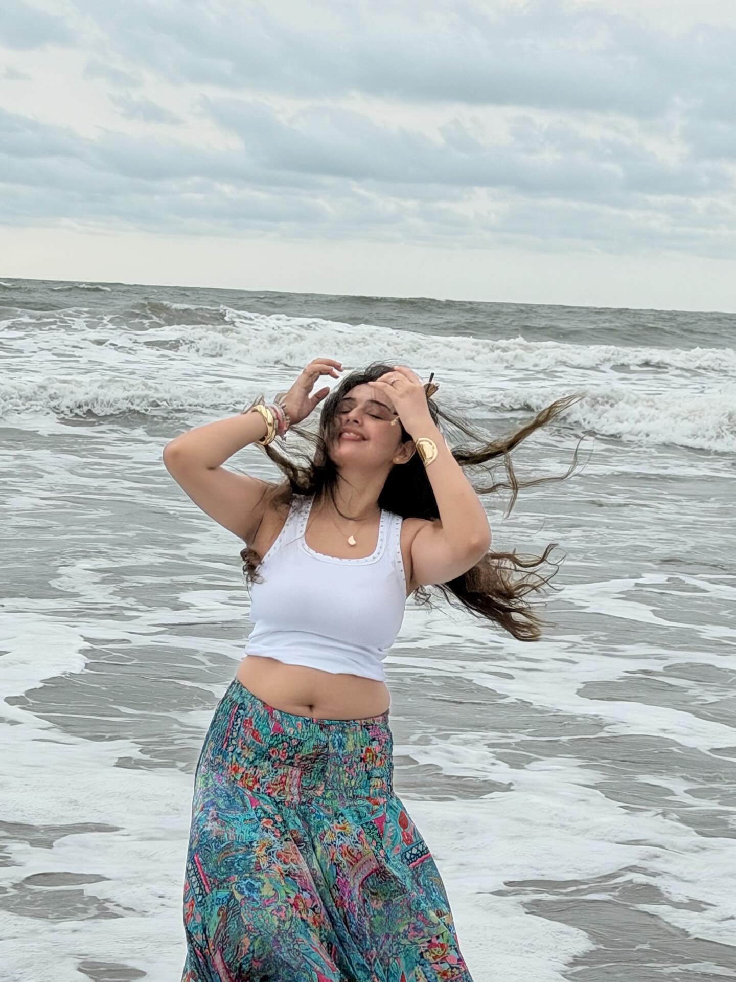 Vedvika Soni Showing Off Chunky Metallic Cuffs