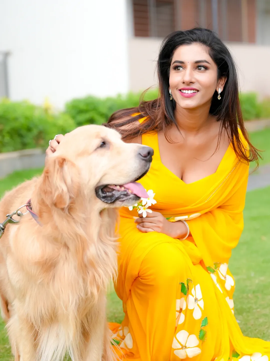 Vishnu Priya Smiles Bright With Golden Retriever