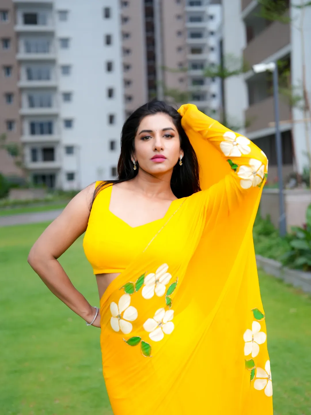 Vishnu Priya Poses Boldly In Yellow Floral Saree