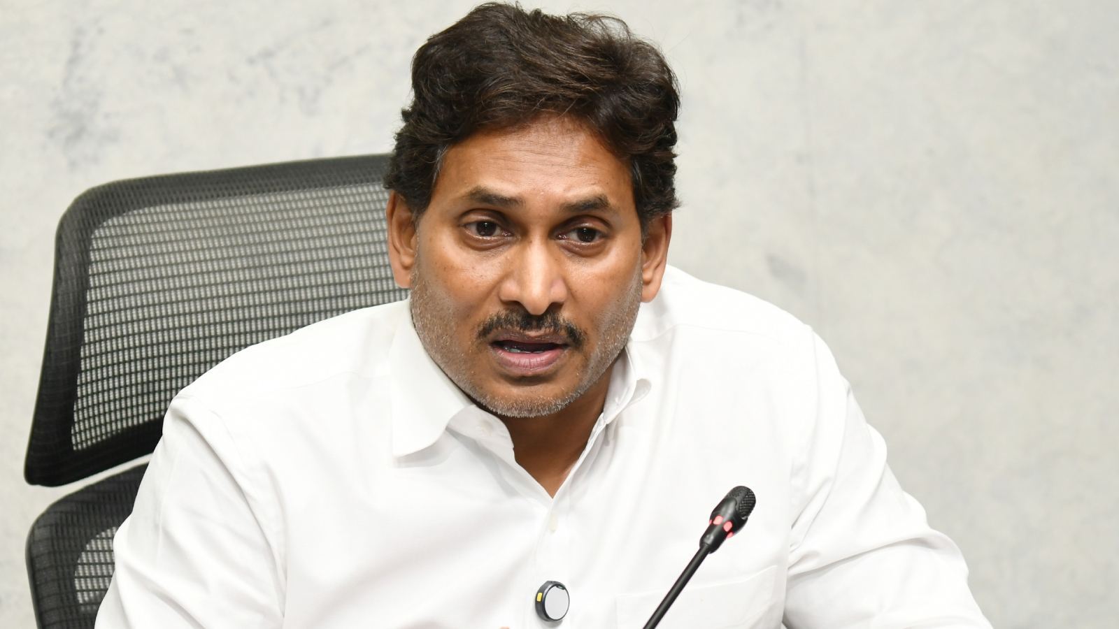 YS Jagan Mohan Reddy speaking at a press conference while criticizing Chandrababu Naidu and discussing Andhra Pradesh politics