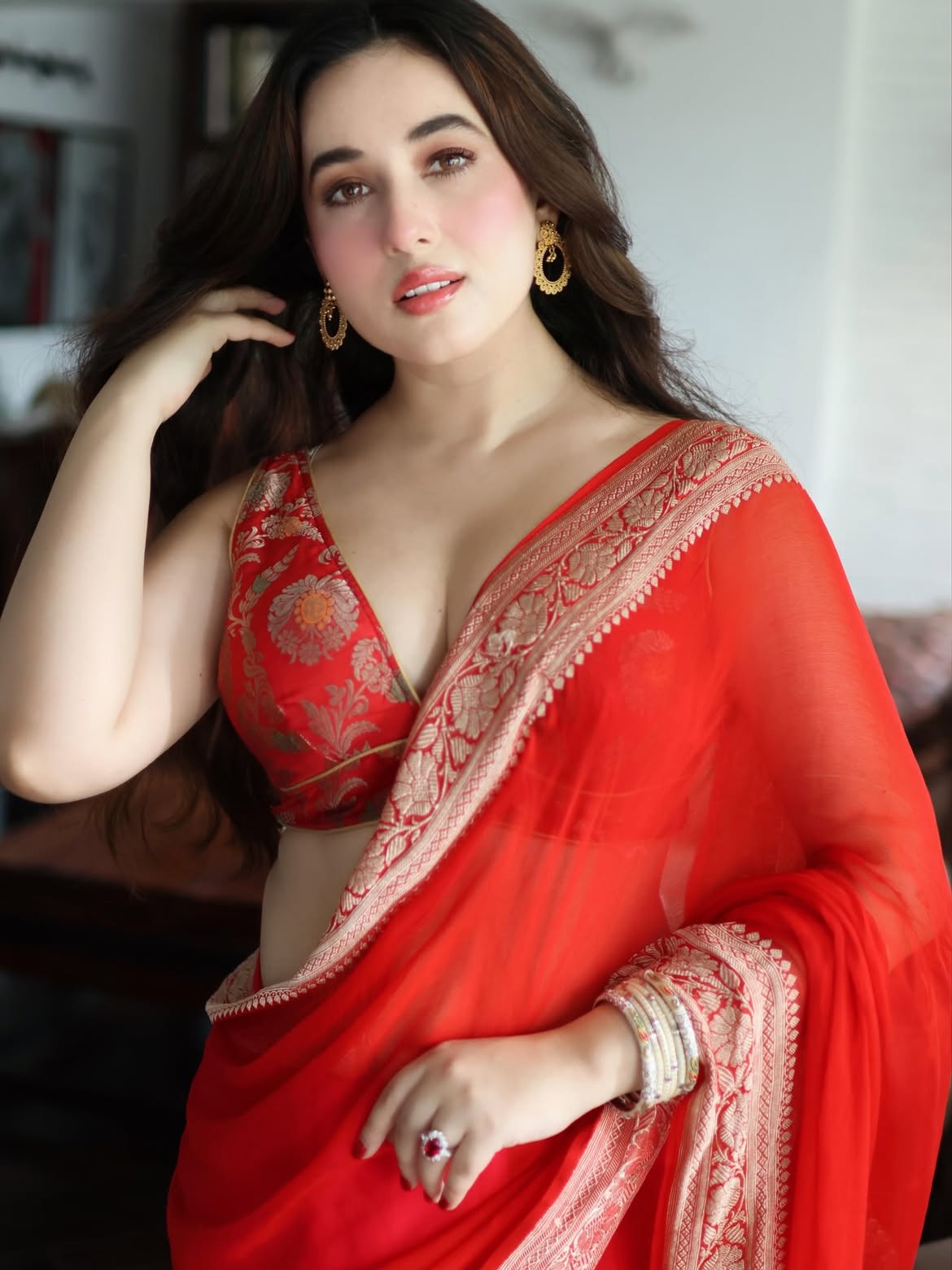 Aditi Budhathoki Flaunts Chic Red Saree Style Now