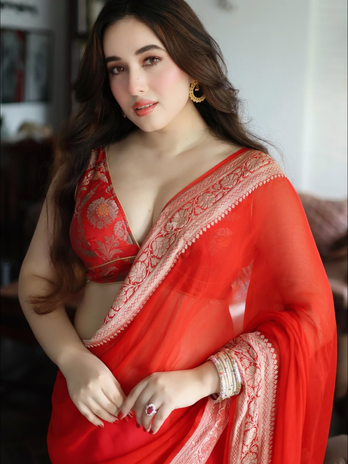 Confident Red Saree Glam With Soft Smile Pose Now
