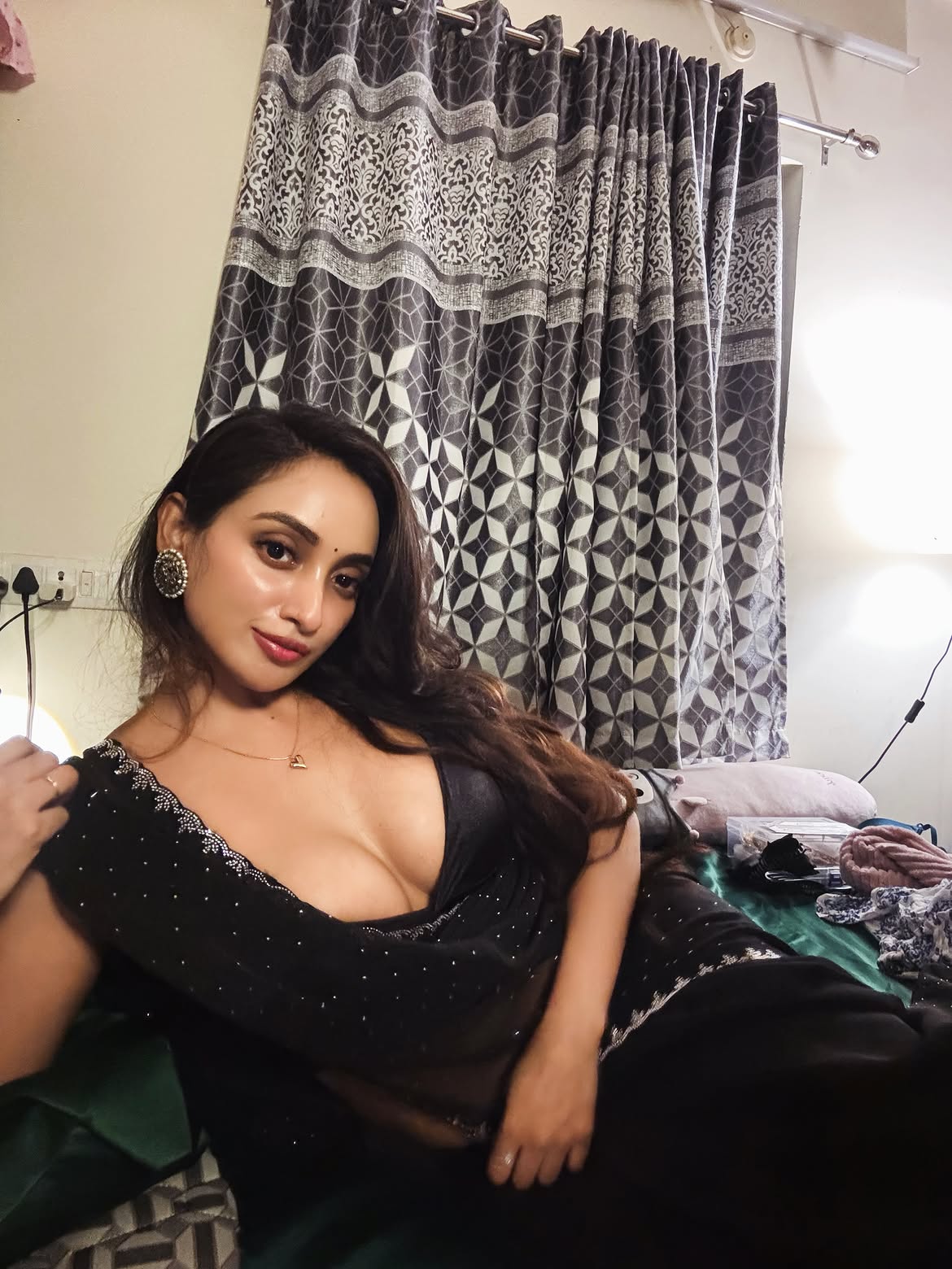 Aparna Reddy Striking A Playful Pose Indoors