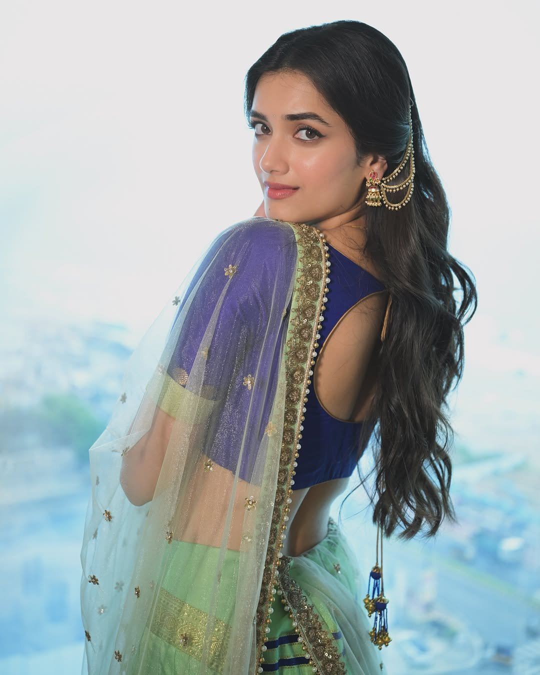 Bhagyashri Borse Striking Playful Side Angle Smile