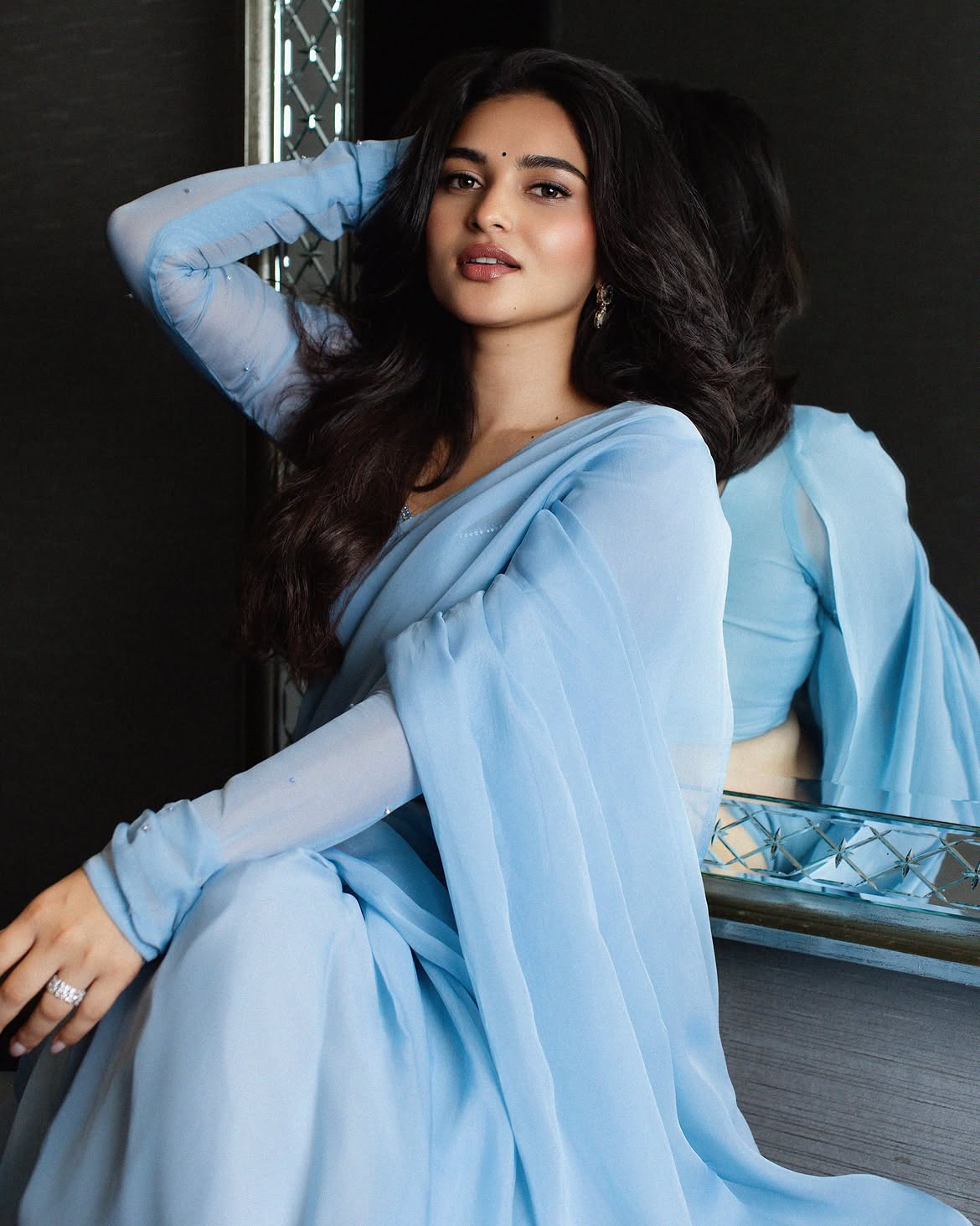 Kayadu Lohar Fixing Her Beautiful Dark Wavy Tresses
