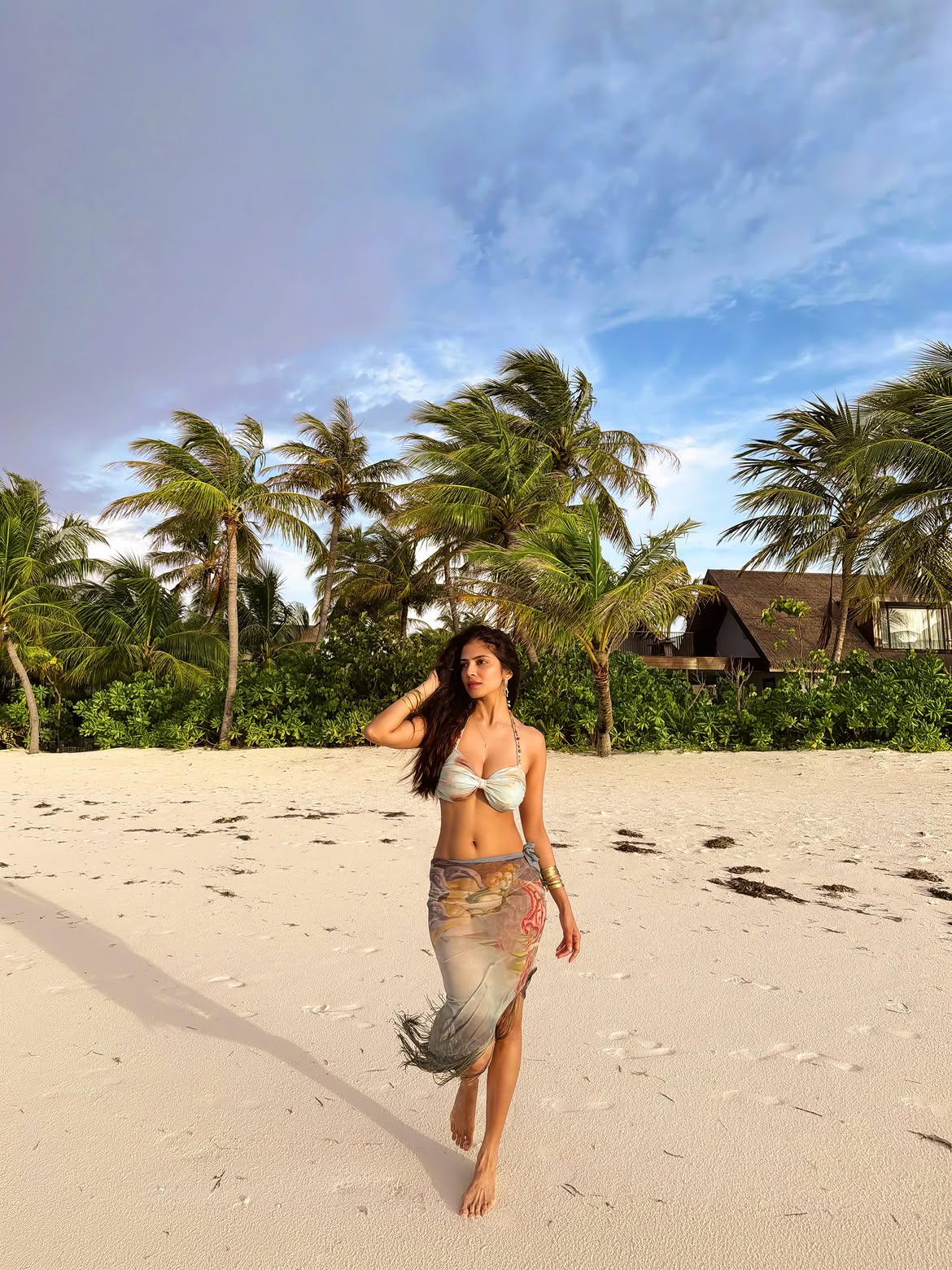Malavika Mohanan Windy Beach Fashion Moment