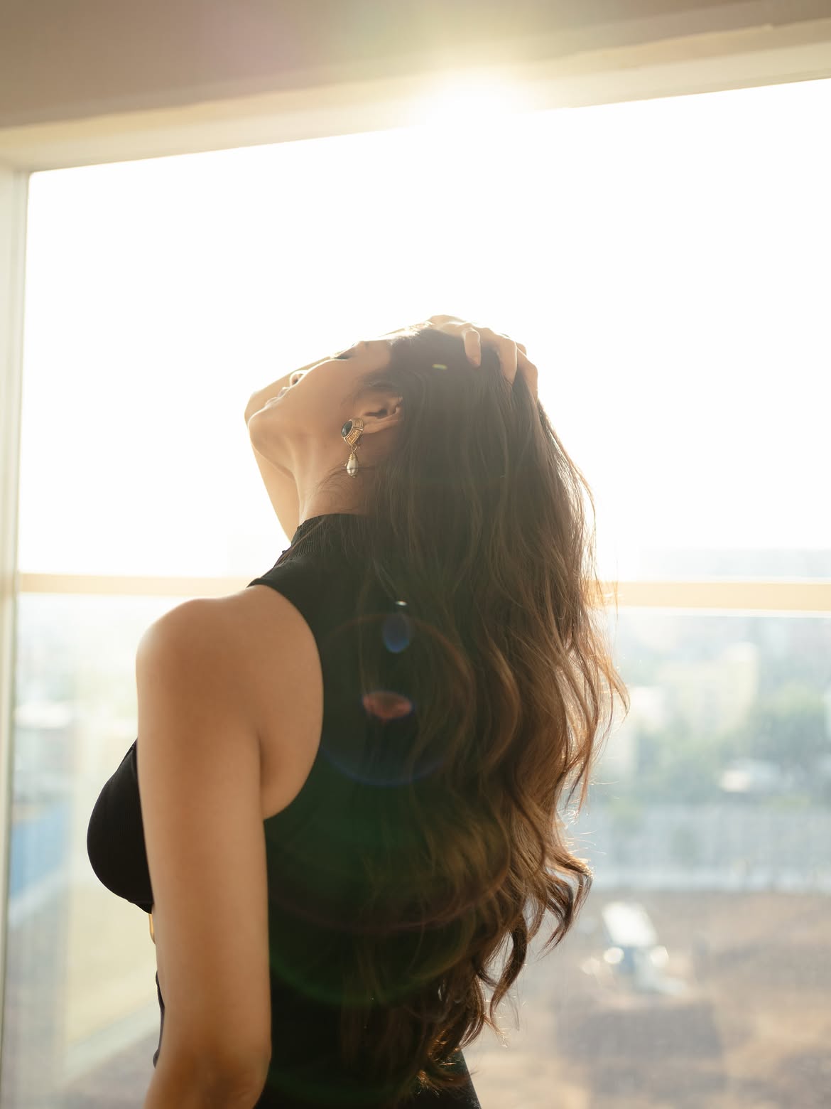 Malavika Mohanan Tossing Her Wavy Hair Backwards