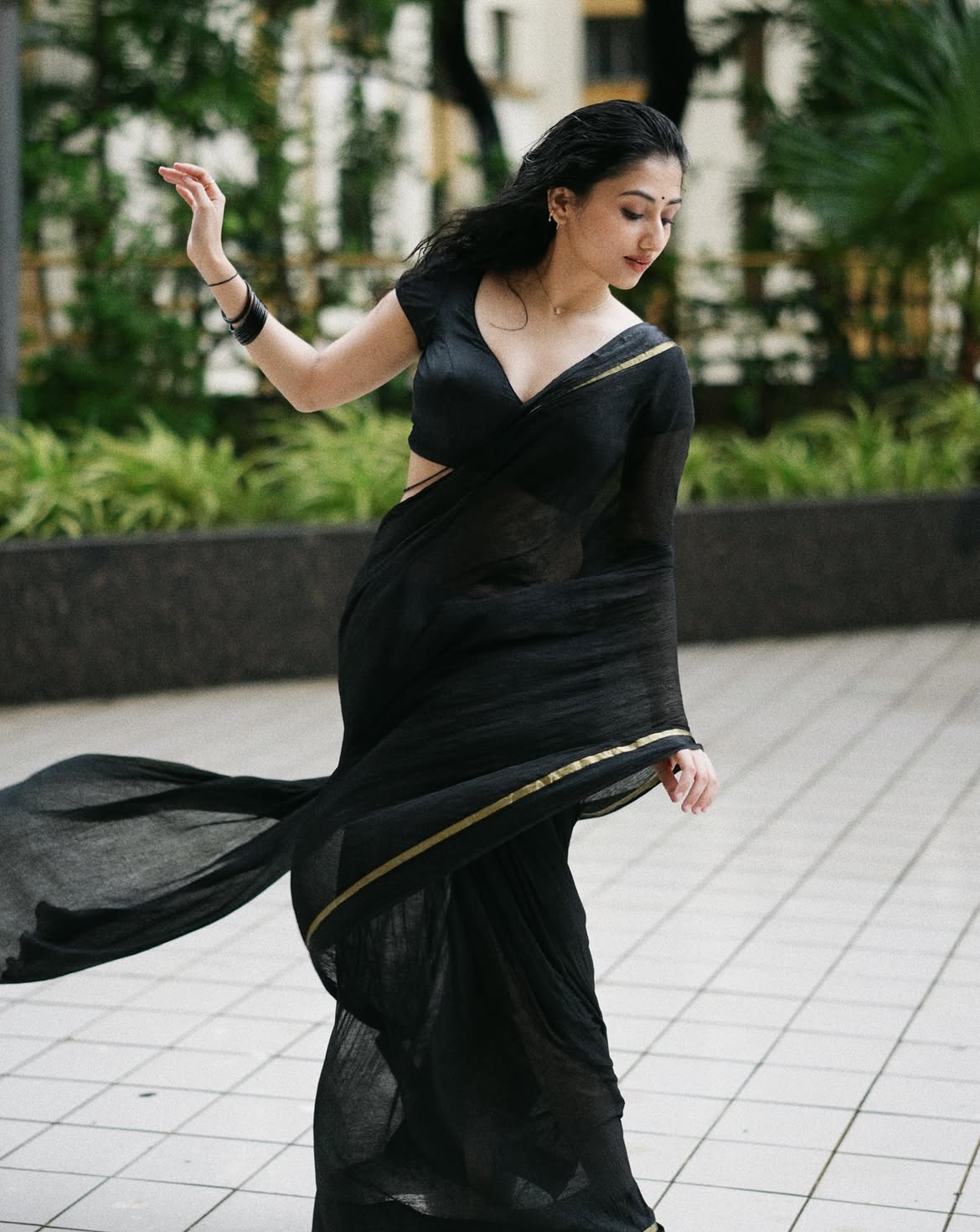 Mazel Vyas Twirling Black Saree Pallu Outdoors
