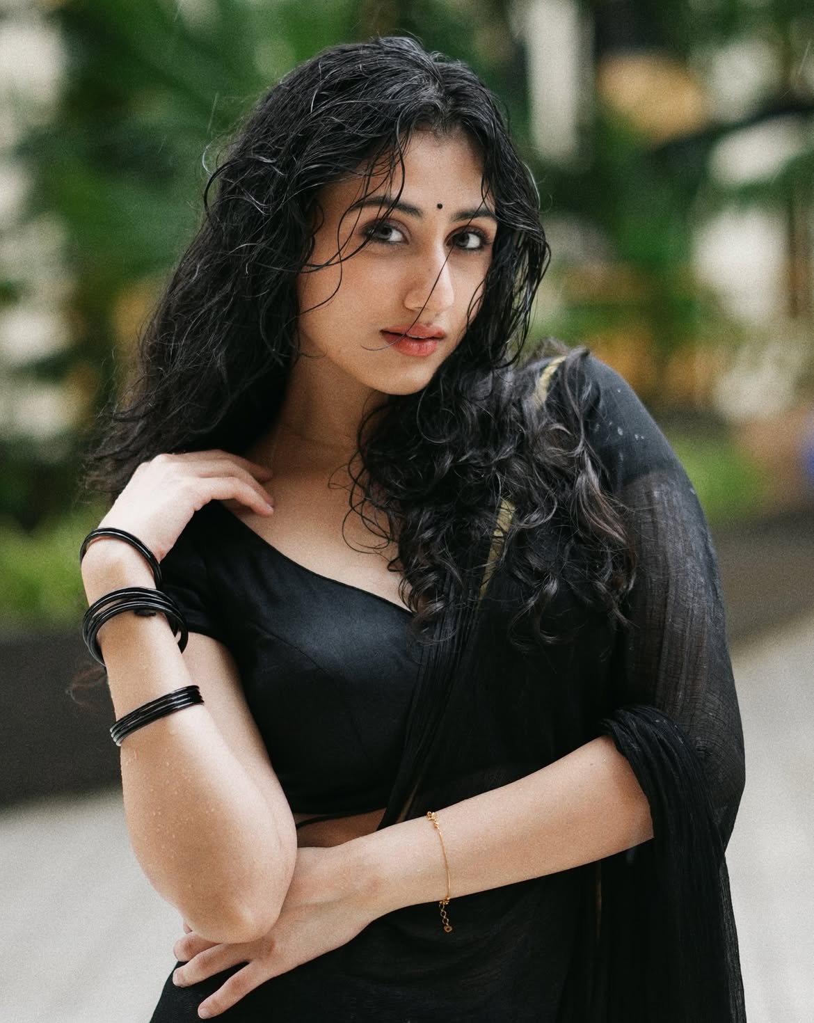 Mazel Vyas Posing Confidently In Black Saree Look